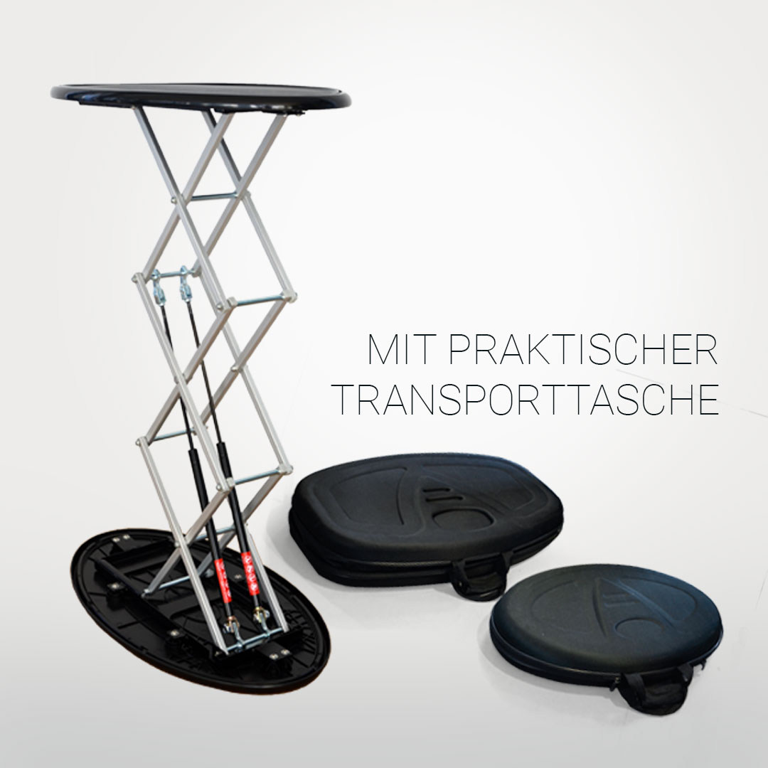 Geöffnete Lift-Theke mit sichtbar ausziehbarem Gestell, daneben zwei schwarzen Transporttaschen in unterschiedlichen Größen